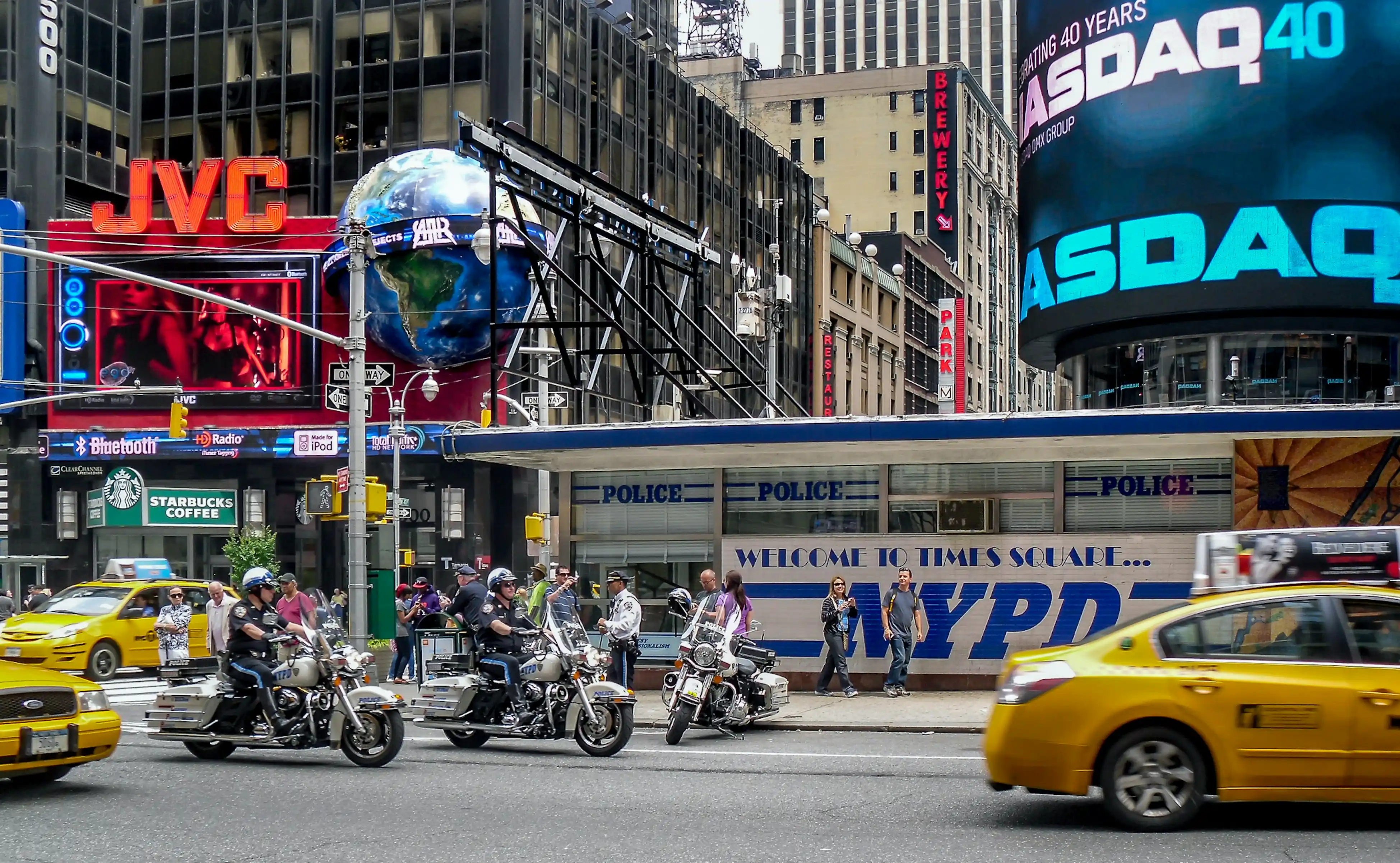 time square nyc police officer issuing ticket